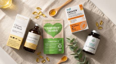 Udo's Choice, Together Health, Equazen and Cytoplan omega-3 supplements arranged on a linen surface